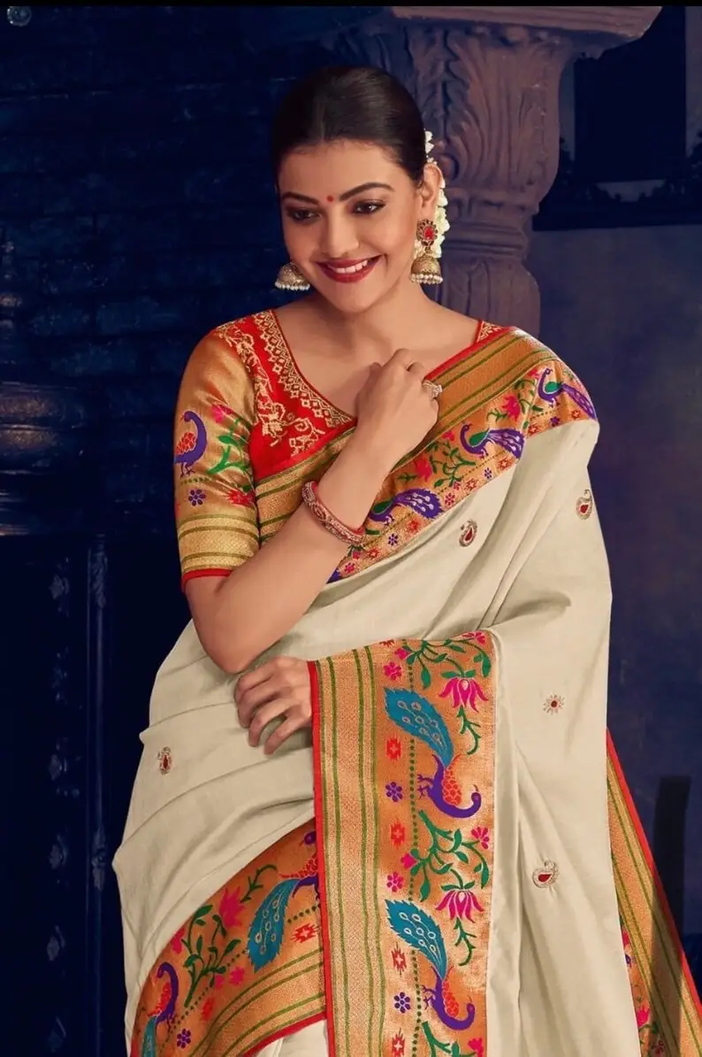 KAJAL AGGARWAL STUNNING LOOKS IN BEAUTIFUL WHITE SAREE RED BLOUSE 2